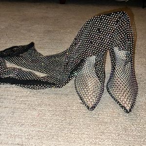 Thigh-high sparkly PLT heels